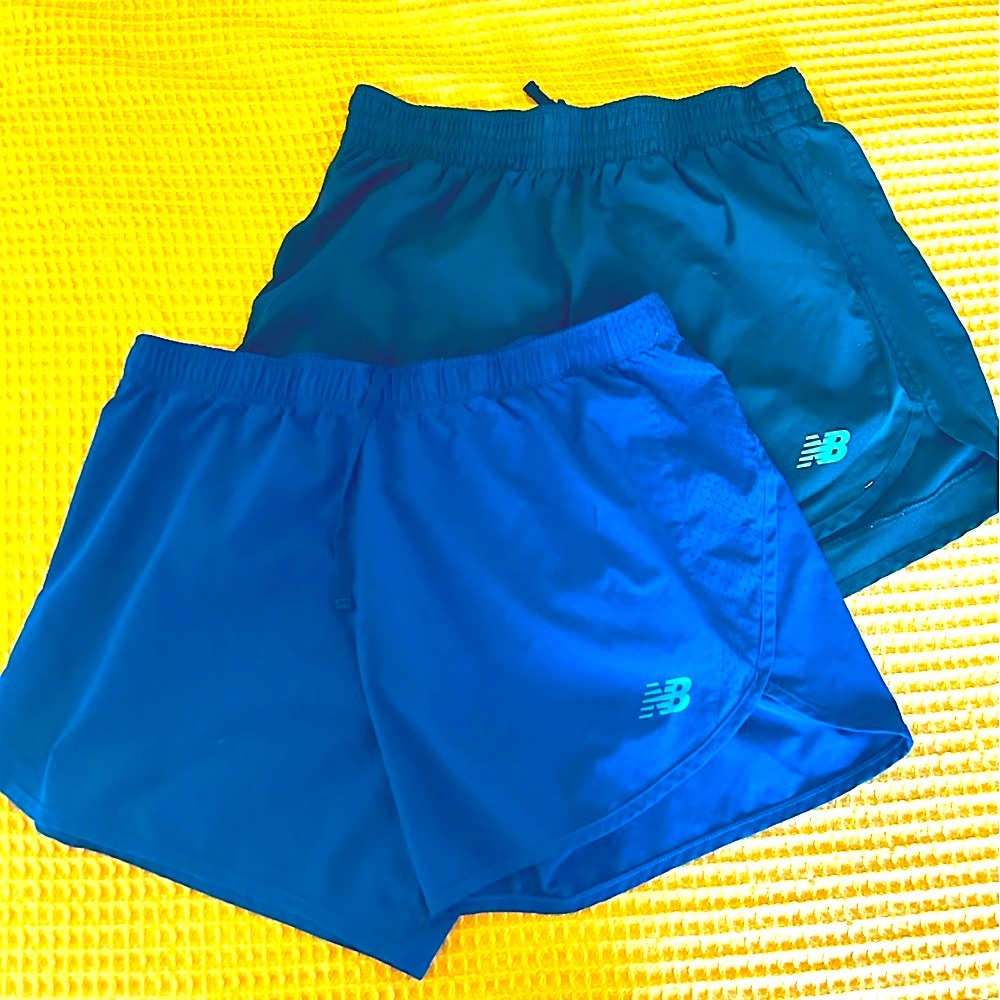 2 pairs New Balance Accelerate shorts